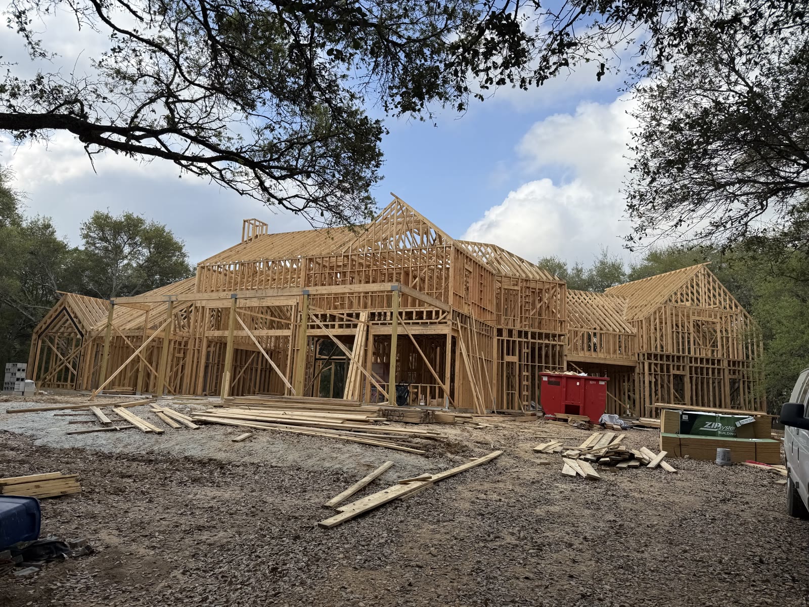 Wood frame being raised on a custom home
